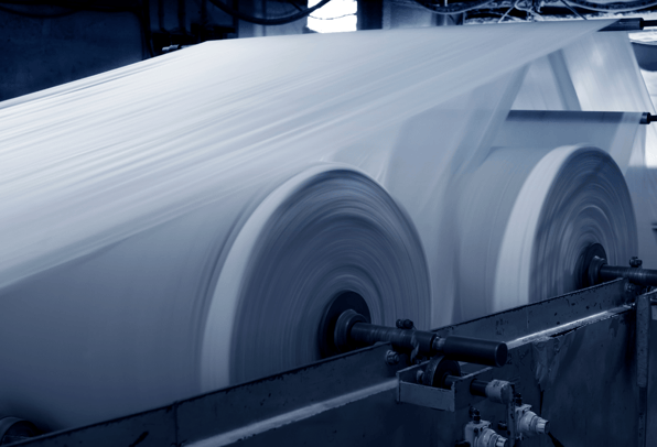 A pulp and paper mill operating at maximum efficiency due to the incorporation of a mid-infrared spectrometer in its paper-making process .